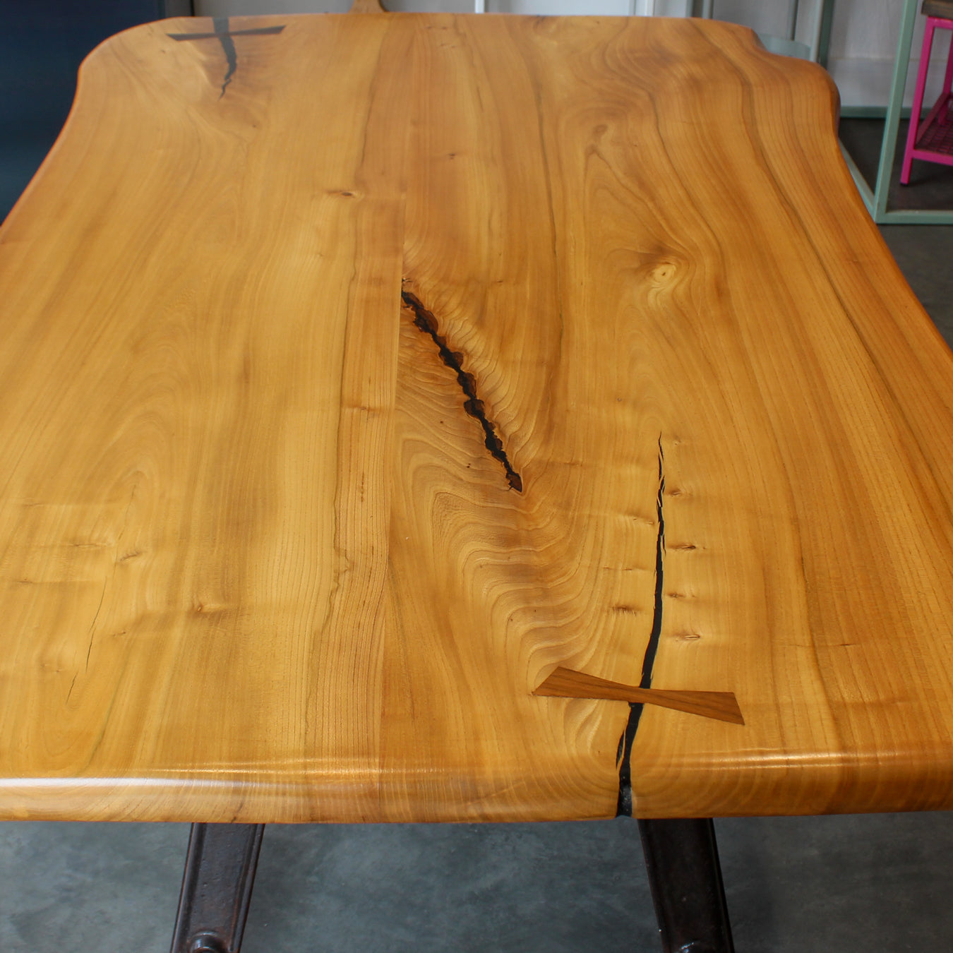 Bamford Table in a styled interior, highlighting its industrial and natural design elements.