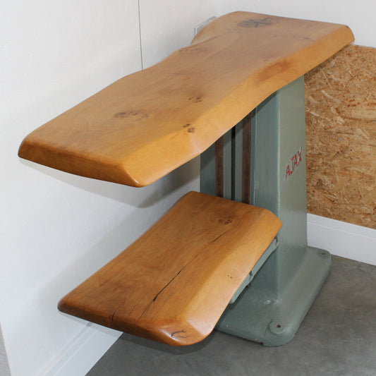 Handmade shelving unit repurposed from a vintage Ajax drill base with live edge oak shelves and cast iron frame.