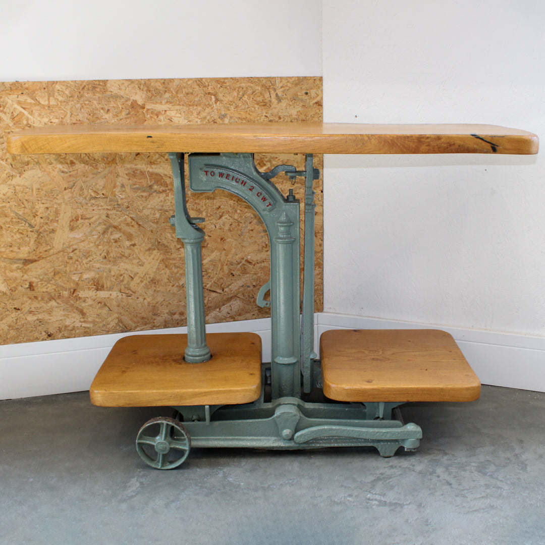 Handmade console table repurposed from vintage Avery industrial weighing scales with lacquered oak shelves and cast iron base.
