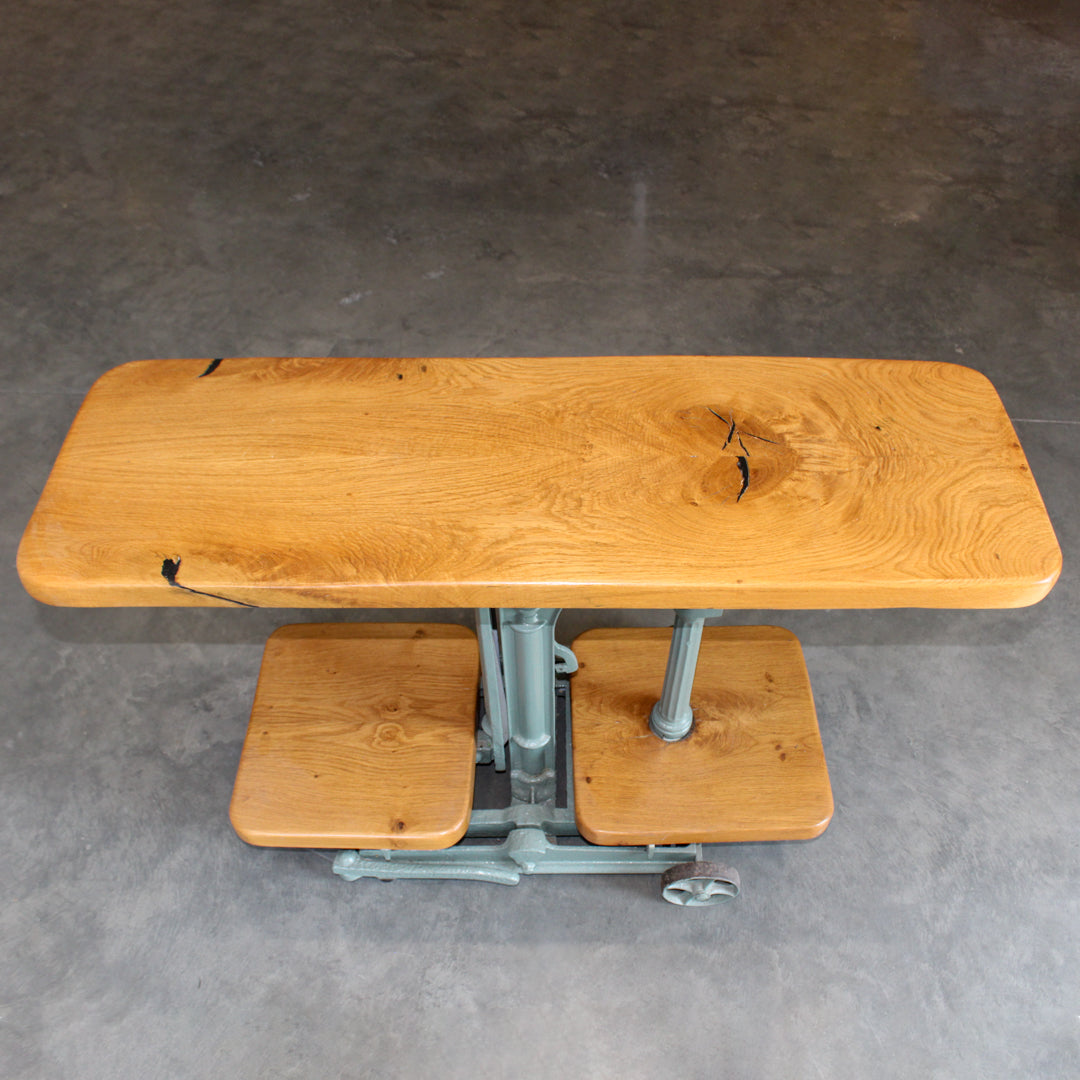 Top of console table repurposed from vintage Avery industrial weighing scales with lacquered oak shelves and cast iron base.