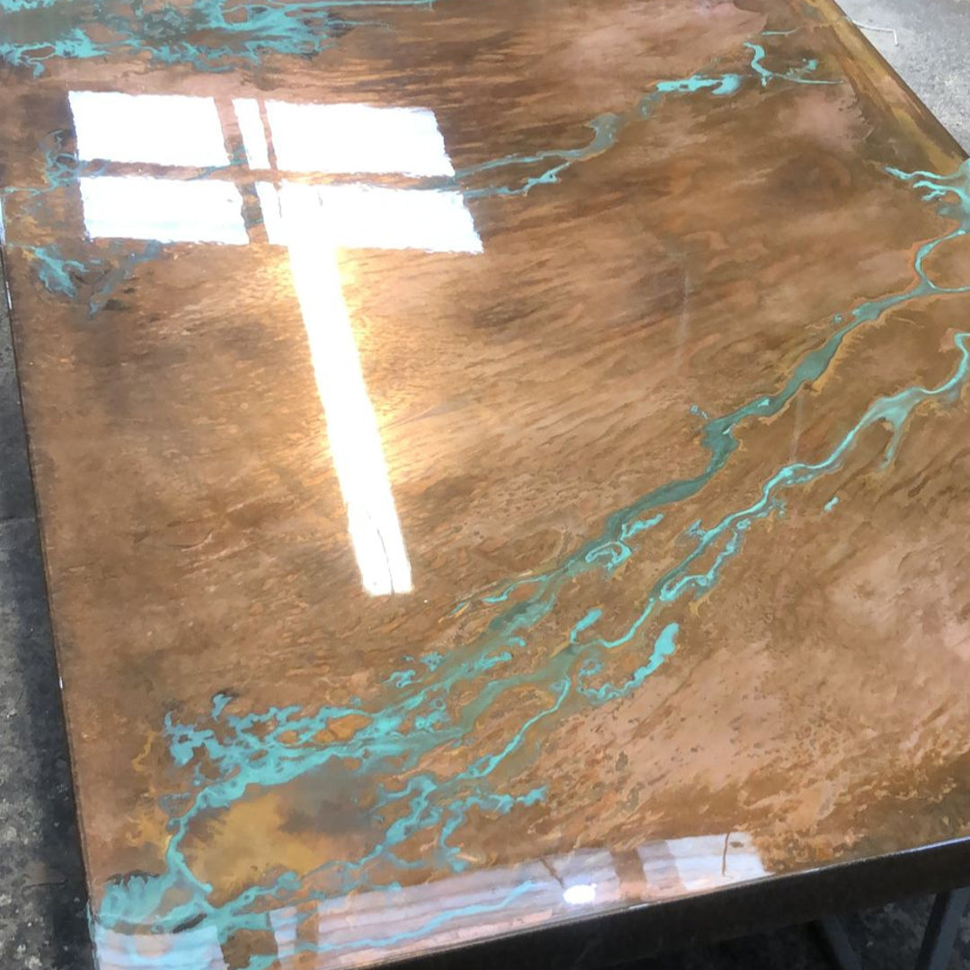 Surface detail of bright green copper patina, highlighting depth and tonal complexity.